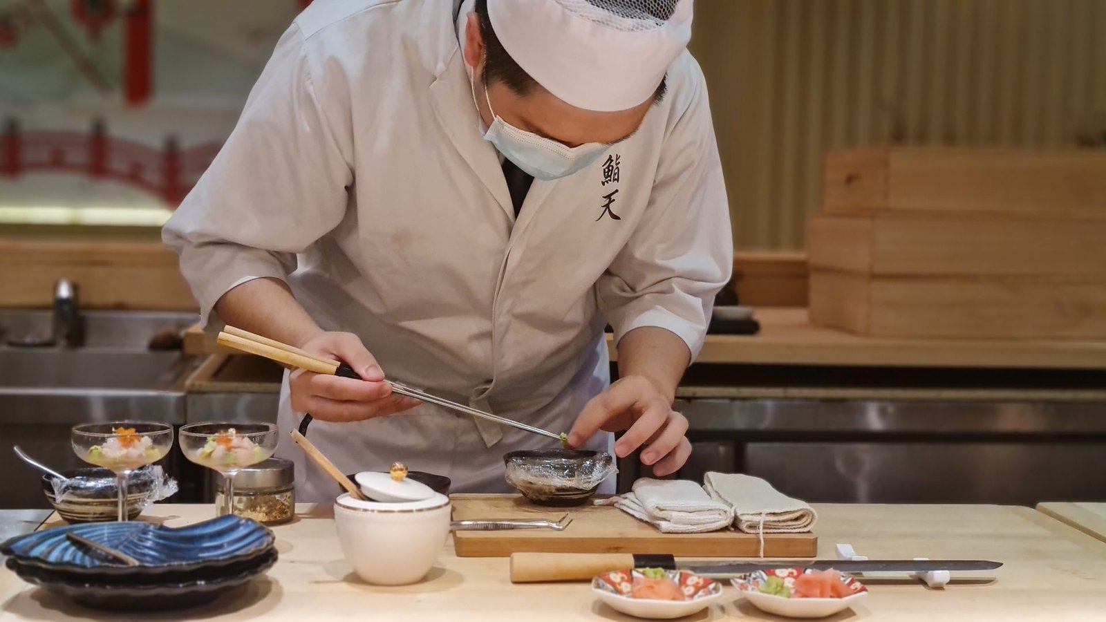 Chef working at a Japanese restaurant counter